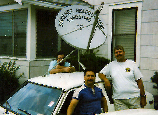 Fidonet network planet connect satellite dish mounted on a used car. Pictured Doc, Bob Tarillo, and Jortis Webb.