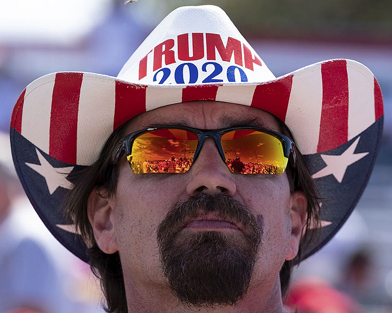 reflection of Perry GA Trump Rally in this supporters sunglasses