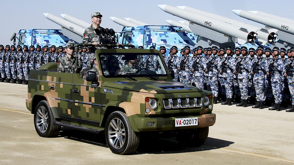 China won military jeep-like utility vehicle with soldiers and rocket launchers. Image credit, Sputnik News.